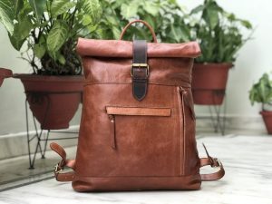 Travel with your belongings in style and comfort with our leather backpack for men. Our top roll leather backpack has multiple compartments to help you stay organized.